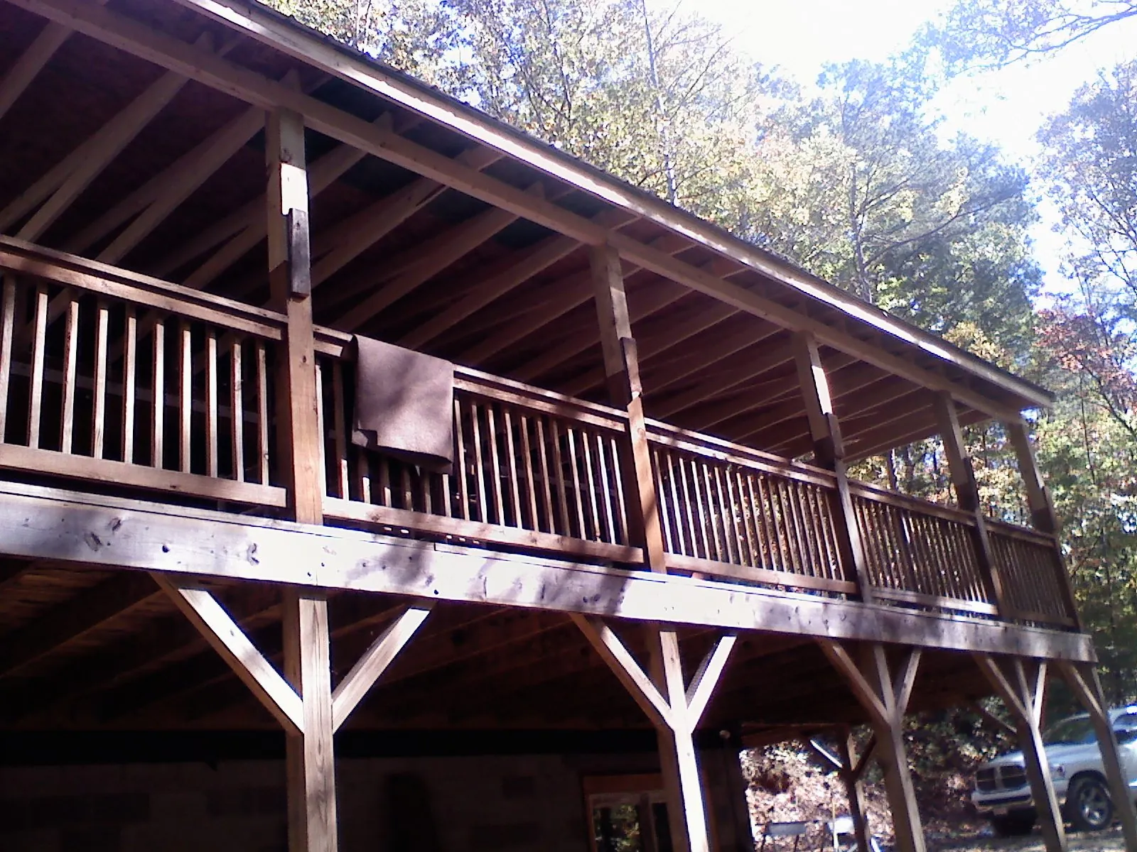Timber framing under a new elevated porch and deck — Roof Leak Repair in Lore City by Roofing Brothers